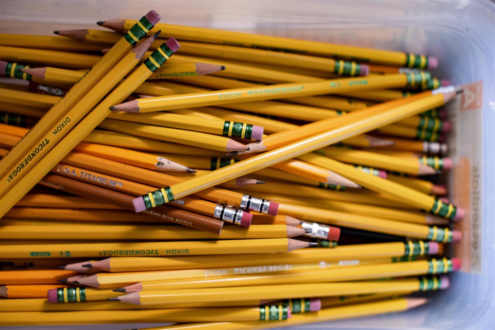  several yellow pencils in a tub
